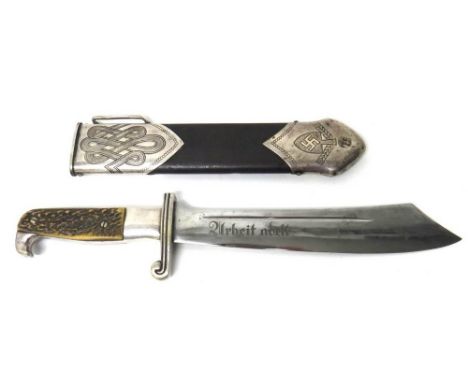 A German World War Two Hewer, the single edged polished steel blade engraved 'Urbeit Adelt' (Labour enobles), and with Carl E