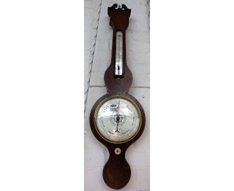 A mahogany wheel barometer by Grafsi & Fontano of Exeter, mid-19th century, with a broken arch pediment over a thermometer an