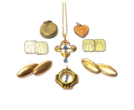 A Victorian 18ct gold mounted compass pendant fob, Birmingham 1896, a gold and pale blue gem set pendant, with a neckchain, a