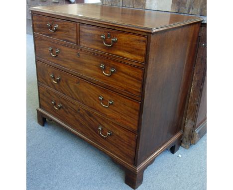 A George III mahogany chest of two short and three long graduated drawers, on bracket feet, 105cm wide. 