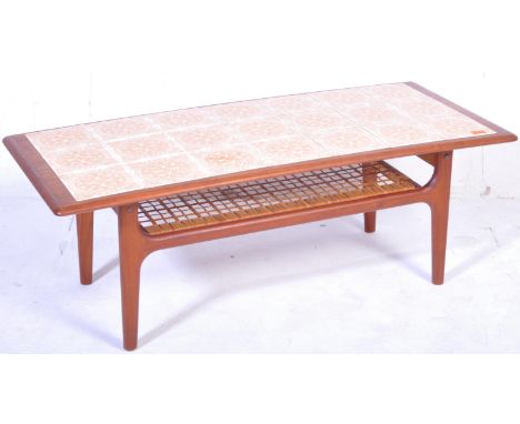 A retro vintage mid 20th century circa 1960s Trioh Danish coffee table of rectangular form having period retro tiles to the t