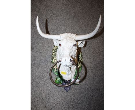 A MODERN CAST METAL BULL HEAD RING TIE