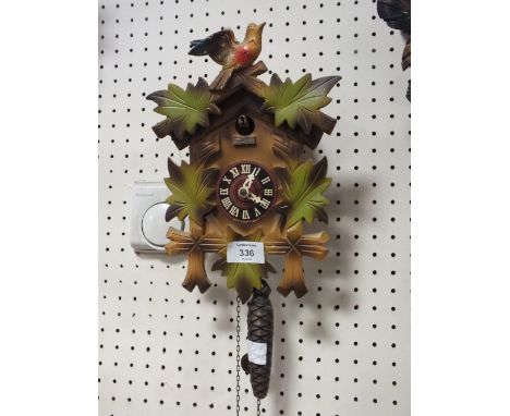 TWO VINTAGE GERMAN CUCKOO CLOCKS - BOTH WITH WEIGHTS AND PENDULUM