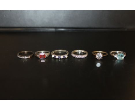 SIX GEM SET SILVER DRESS RINGS TO INCLUDE AN OPAL STYLE EXAMPLE