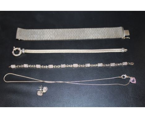 THREE STERLING SILVER BRACELETS TOGETHER WITH A SILVER GEM SET HEART PENDANT ON CHAIN AND A PAIR OF EARRINGS - APPROX COMBINE