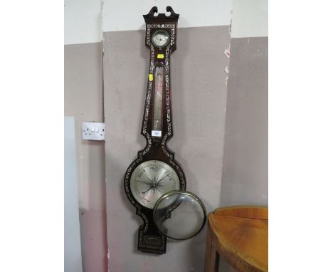 A 19TH CENTURY ROSEWOOD AND MOTHER OF PEARL ANEROID BAROMETER