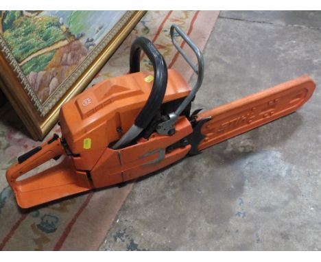 A HUSQVARNA CHAIN SAW