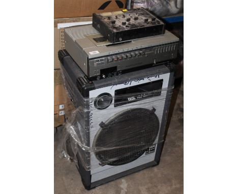 A LARGE EXCEL POWER SERIES SPEAKER TOGETHER WITH AN AKAI VS-9800EK VIDEO CASSETTE RECORDER AND A REALISTIC STEREO MIXING CONS