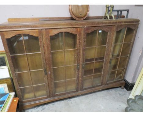 A VINTAGE OAK GLAZED BOOKCASE W-180 CM S/D