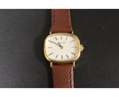 A LADIES TISSOT AUTOMATIC WRIST WATCH ON LEATHER STRAP