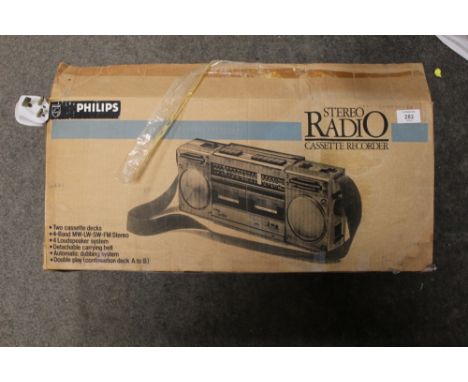 A BOXED VINTAGE STEREO RADIO CASSETTE RECORDER