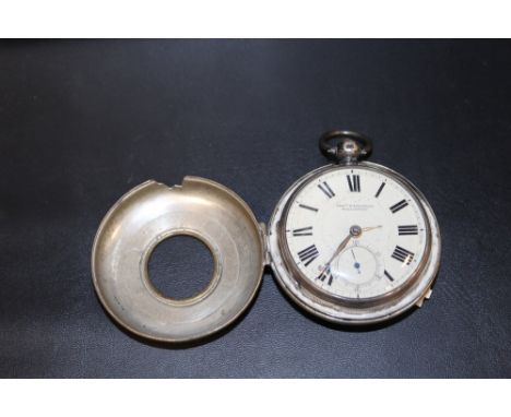A HALLMARKED SILVER OPEN FACED MANUAL WIND POCKET WATCH BY THOMAS WILLINGTON IN SILVER PLATED OUTER CASE