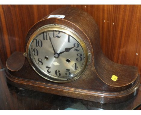 A VINTAGE OAK CASED GUSTAV BECKER MANTLE CLOCK