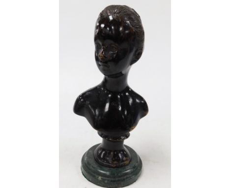 An early 20thC Continental bronze bust of a girl, raised on a green marble socle, 22cm high.