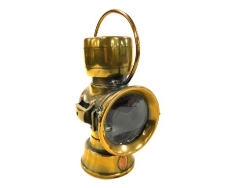 A Lucas King of the Road brass side lamp, with copper plate stamped 634, 26cm high.