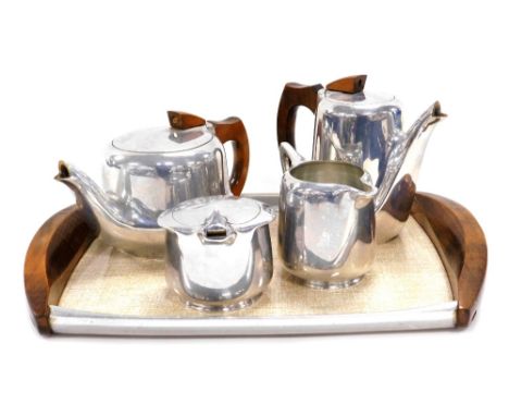 A mid 20thC Picquot ware five piece tea set, comprising teapot, hot water jug, cream jug, sucrier and twin handled tray. 