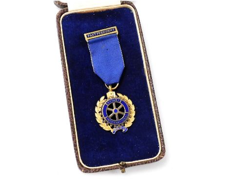 A Rotary International silver gilt and enamel jewel, Past President, 1966-7, cased.