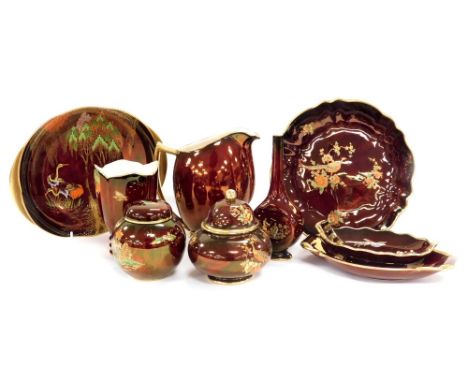 A group of Carltonware Rouge Royale pottery, including a jug, bowls, jars and covers, and vases. (9) 