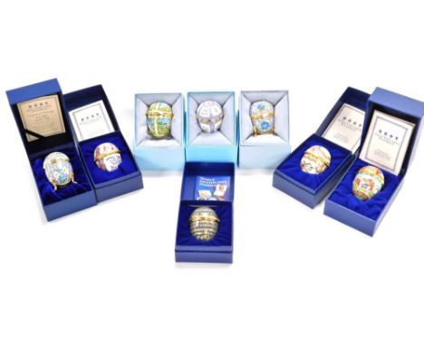 Eight Halcyon Days enamel egg shaped trinket boxes, to include Easter 2004, flowers, Easter 1998, Zodiac, etc, each 6cm high,
