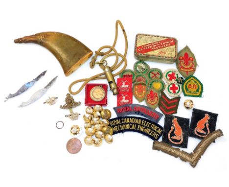 Military buttons and cap badges, military felt badges, a Skyrme trophy medal 1966, an Acne City Whistle, and a 19thC horn pow