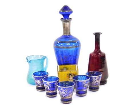 A Venetian blue glass and silver lustre decanter, and five tots, decorated with the Lion of St Marks, a ruby glass bottle, a 