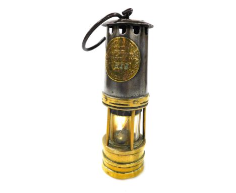 An Ackroyd and Best Limited Hailwoods Improved Miners Lamp, number 518, 28cm high.