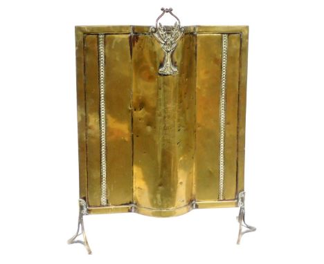 A Victorian brass fire screen, raised on shaped legs, 68cm x 56cm. 
