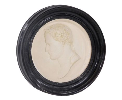 An early 19thC plaster bust of Napoleon Bonaparte, signed Andrieu, bust portrait with a laurel wreath, bears label verso, Fro