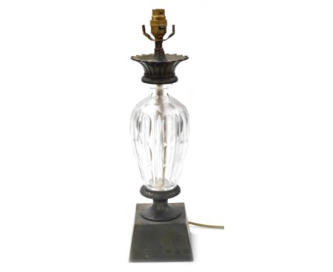 An early 20thC Continental cut glass and brass table lamp, 49cm high.