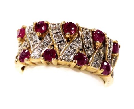 A 9ct gold ruby and diamond ring, in a compressed lattice work design, size I, 3.5g.