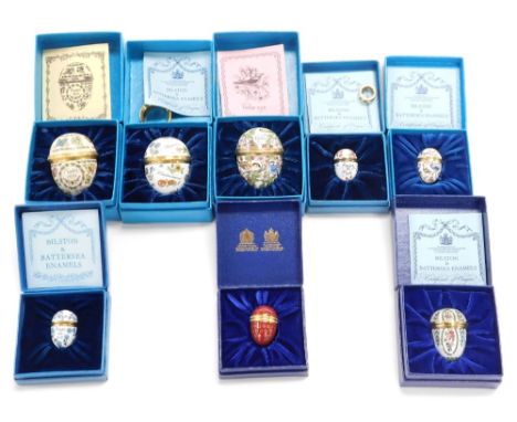 Eight Bilston &amp; Battersea Enamels egg shaped trinket boxes, designed by Halcyon Days, various sizes and designs, to inclu