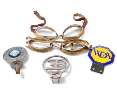 Three car badges, comprising a Royal Automobile Club Association badge F140602, an EB badge and a Women's Driver Association 
