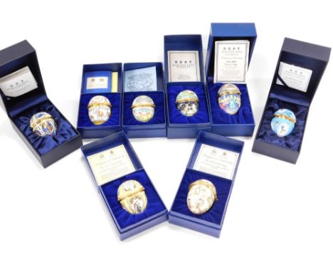 Eight Halcyon Days enamel egg shaped trinket boxes, to include 1988 and 2000 Egg, Easter 2013, etc, each 6cm high, boxed. (8)