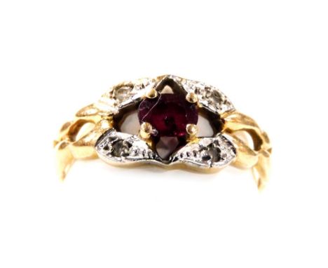 A 9ct gold ruby and diamond ring, in an abstract floral setting, size K, 1.6g.