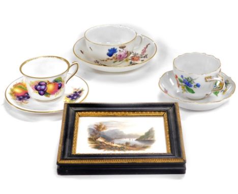A Meissen porcelain coffee cup and saucer, painted with flowers, further Meissen teacup and saucer, Royal Worcester porcelain