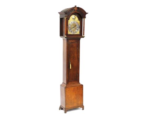 A George III oak cased longcase clock, by Farrington of Ludlow, the brass break arch dial with gilt spandrels of sea creature