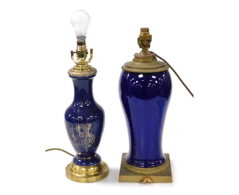 An early 20thC Continental blue ceramic and brass table lamp, 42cm high, and a Continental blue glazed ceramic table lamp of 