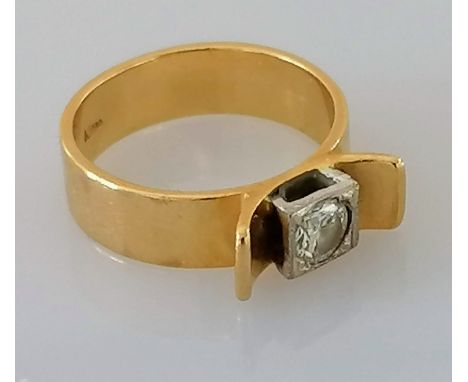 A 1970's yellow gold artisan solitaire ring with a round brilliant-cut diamond, approximately 0.32 carats, colour J/K, clarit