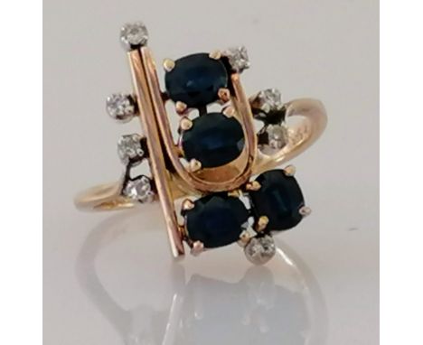 A mid-century sapphire and diamond cocktail ring on a white and yellow gold setting, size N, 20 w x 11mm d, stamped 585/18k, 