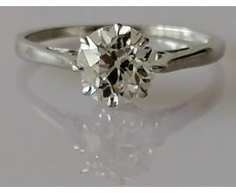 A certified solitaire old European-cut diamond ring measuring 1.24ct, estimated colour/clarity G-H, VS2-SI1, fluorescence -ni