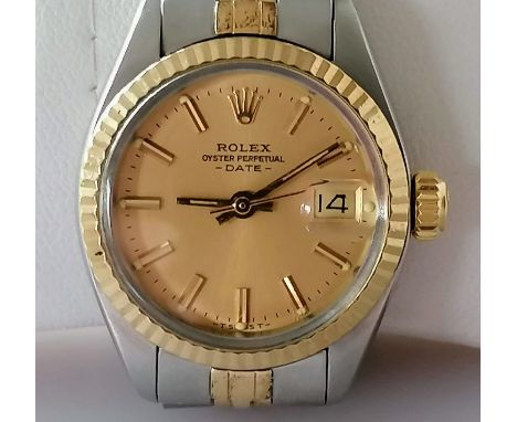 A Rolex Oyster Perpetual Date bi-colour stainless steel, signed jubilee link bracelet watch, 62523-D14, gold face, centre sec