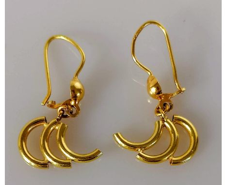 A pair of gold earrings with C-pipe design, unmarked, tests for high quality gold, 3.82g