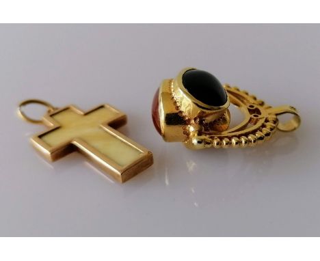 A 9ct gold oval jade, carnelian and black onyx swivel fob pendant, hallmarked and a yellow gold crucifix with inset ivory dec