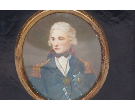 English school circa 1800 - portrait miniature of a gentleman wearing a blue jacket and white waistcoat, oval on ivory, frame