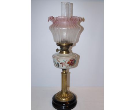 Victorian brass oil lamp with hand painted milk glass reservoir, overall height 66cm  