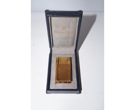 Good quality Rothschild cigarette lighter in its original case 