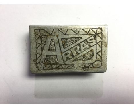 WW1 British Trench Art Matchbox Cover. Folded alloy inscribed with decoration and "Arras" to front and "T Clarkson" to spine 