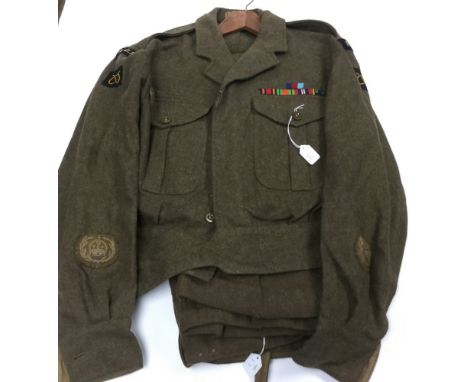 British 1949 Pattern Warrant Officers Battledress Blouse with original insgnia. "RCT" shoulder titles and Staffordshire Knot 