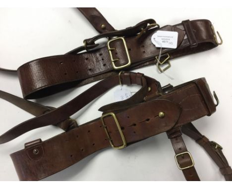 WW2 British Sam Brown belts, pair. The first is complete with addition of the Sword Frog. The second is a/f with leather loop