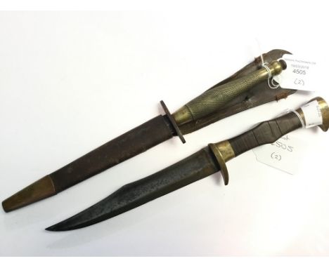 WW2 British 2nd pattern FS Knife with brass hilt and 70mm long plain double edged blade and complete with scabbard. Leather t